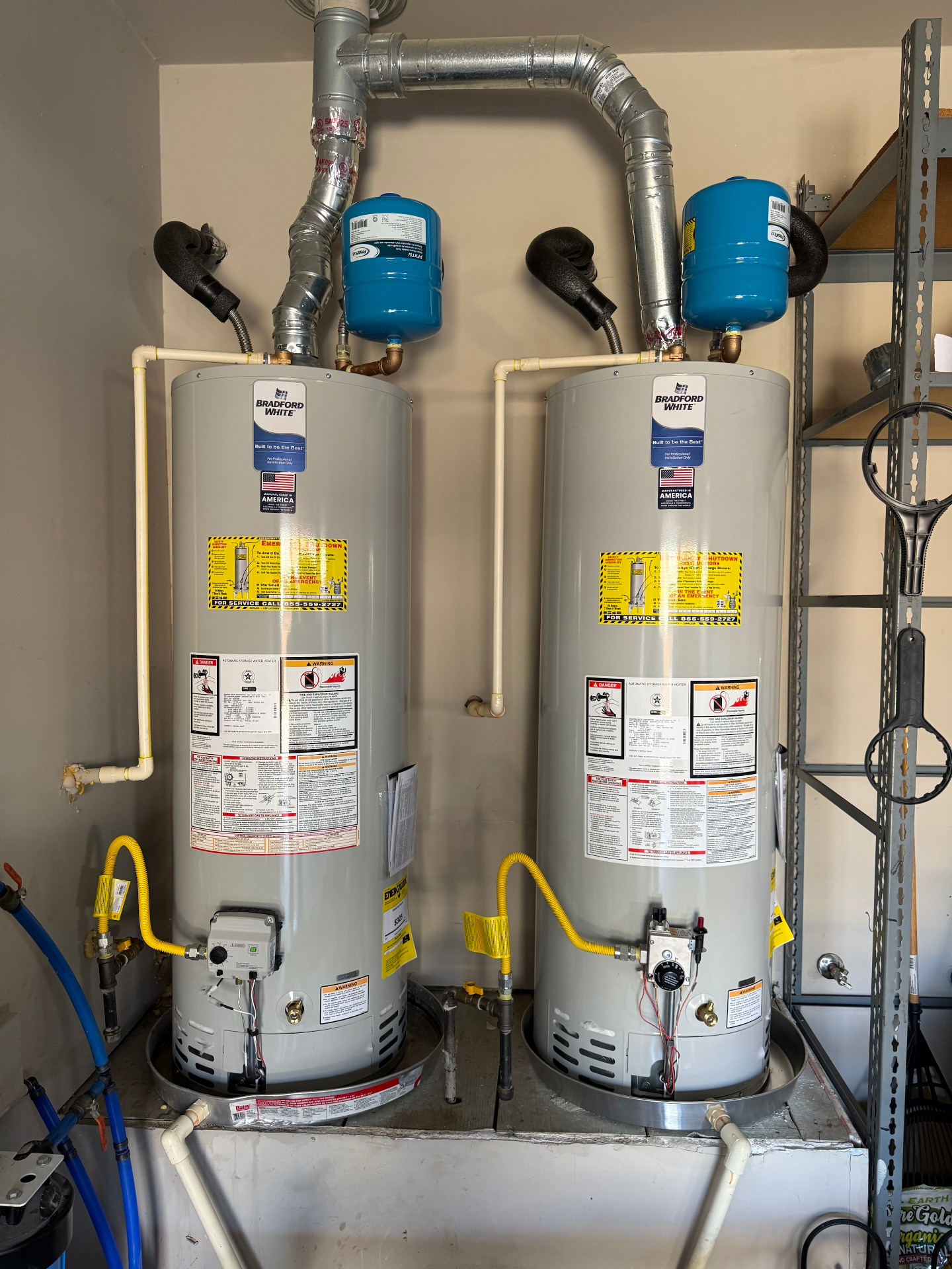 Clean modern tankless water heater installation in a bright utility room